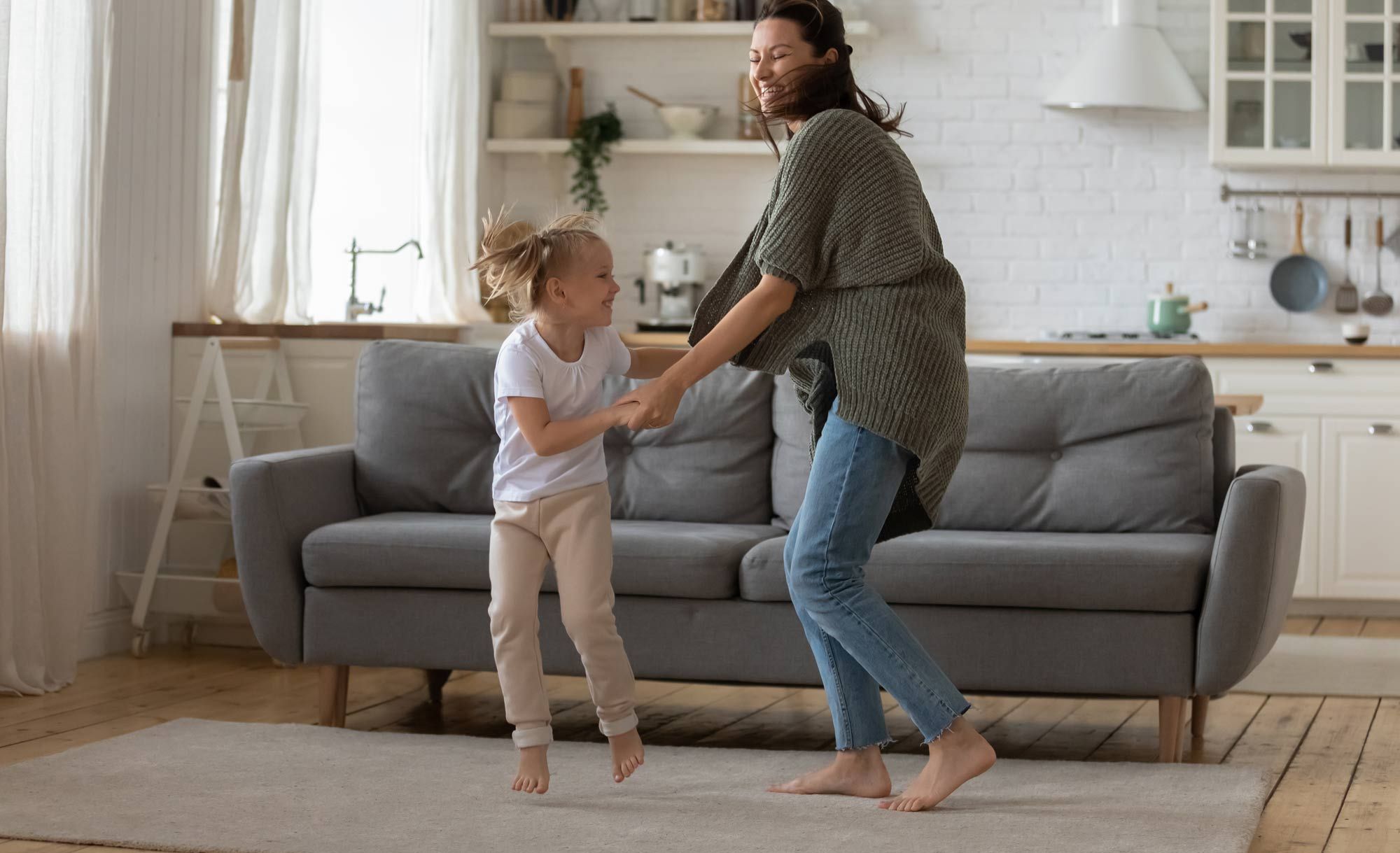 Woman and child dancing
